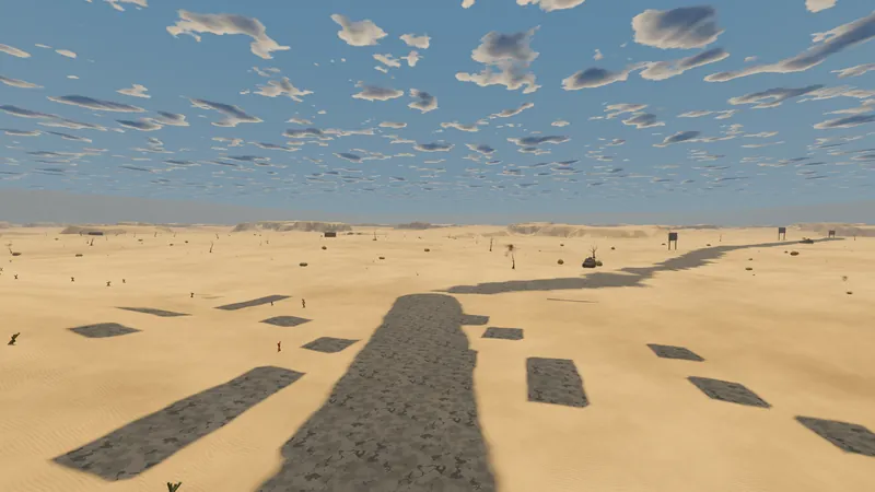 A cracked road leading across desert sand toward distant buildings