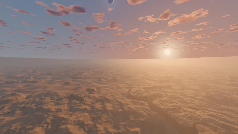 Sunset over rippled desert dunes under a pink-streaked sky